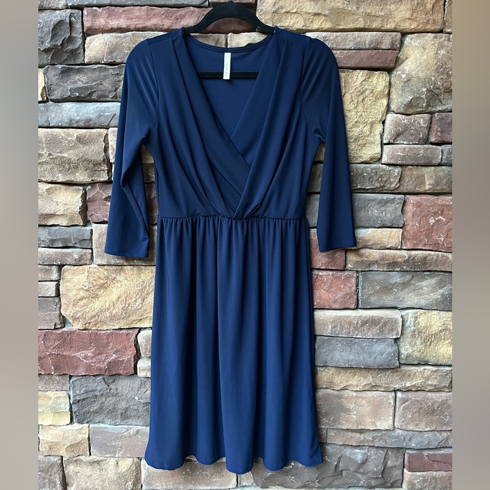 Navy knit dress with Layered folds at bust Elastic waist sz small